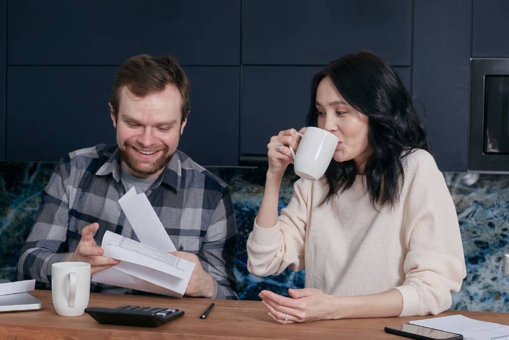 Couple planning financial protection strategy discussing prenup alternatives together